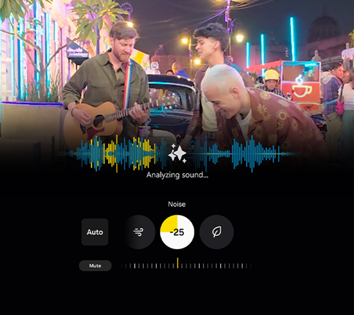 A small band playing music with Galaxy AI analyzing the sound and reducing the background noise from the busy street they are playing on with Audio Eraser.
